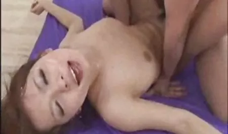 Daughter playing with hairy old nurse