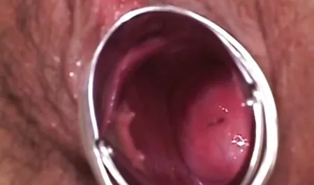 Mature brunette shows her hairy pussy