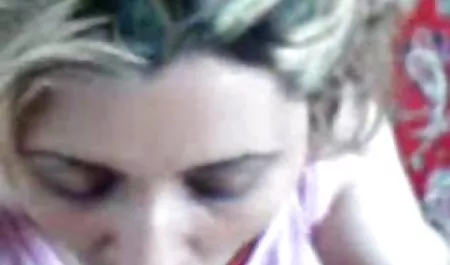 The guy in the tattoo is being pumped up in the bedroom by a hot girlfriend.