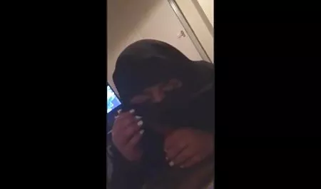 Tanned babe sets up a tent on the beach