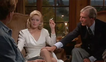 Sexy babe undressing in front of a guy