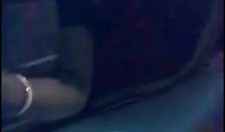 Behind the naked slender chick peeping on a nudist beach through the camera