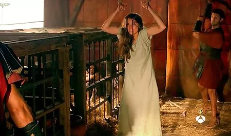 Young babe in latex plays with her neatly trimmed kitty