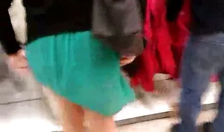 Girl with dyed hair caresses pussy