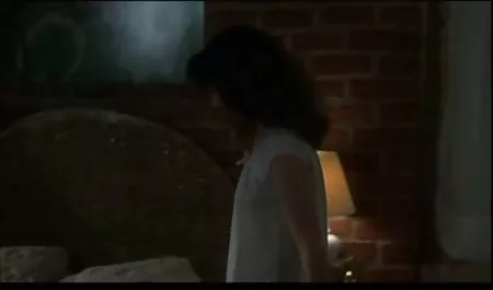 The teacher tickles the feet tightly tied ebony