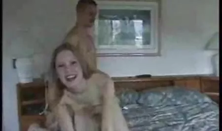 Two black dicks deep in the mouth of a star of the sex