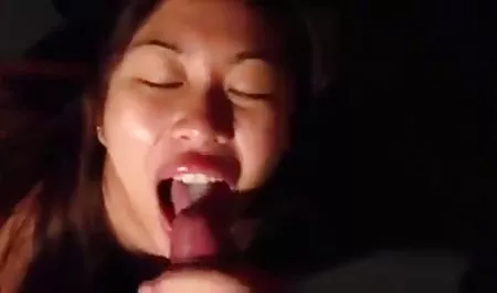 Beautiful girl smokes in bed after passionate sex with her beloved