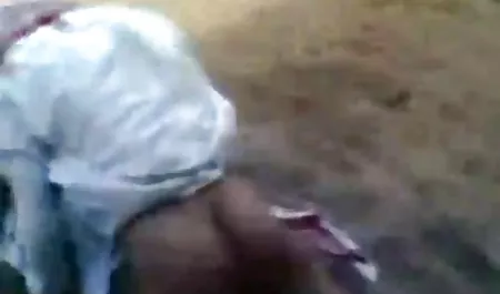 Very flexible girl watering herself with kefir