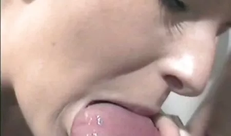 Submissive blonde caresses a guy's penis and sucks his head