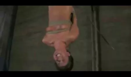 Two Asian with hairy pilots roam the beach