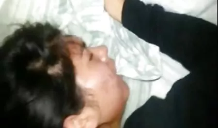 Sister teaches brother kissing