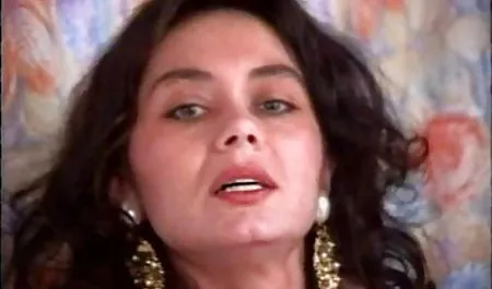 Brunette is planting hairy pussy on a large device