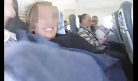 Tattooed blonde with big buffers participates in a photo shoot