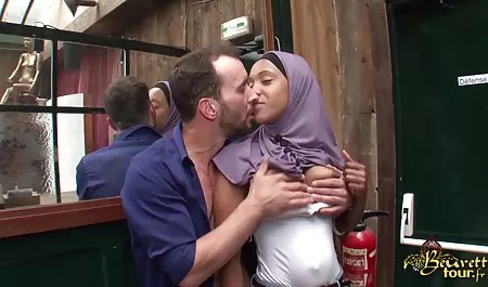 Lustful brunette smokes and puts fingers in wet kitty