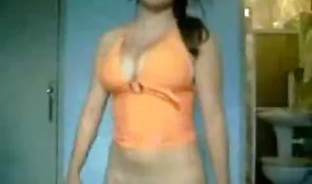 Russian blonde with big breasts satisfies herself in the bedroom