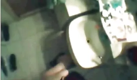 Tanned girl takes a shower with her girlfriend