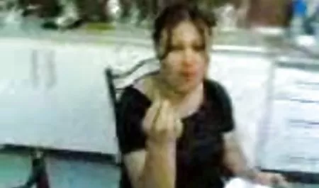 Brunette with beautiful and large breasts dressed on camera