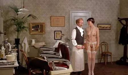 Girl in stockings in the net is spying on the popu with the peasants