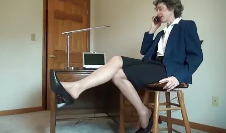 Adult slut with a short-cut, undressed in public by the river