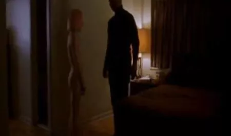 Hot blonde in white dress caresses clitoris sex toy