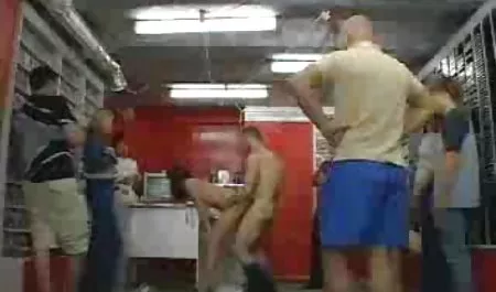 Young people playing in the sex version of the bottle