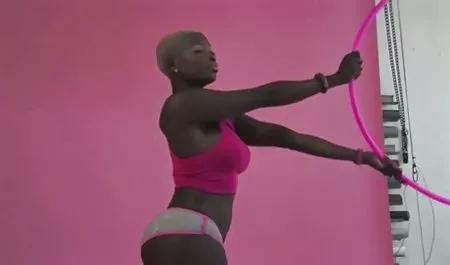 Young lesbians resting on the shore of the lake