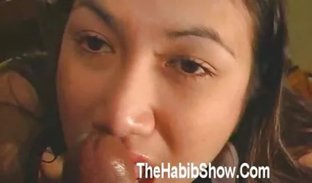 Behind a naked man and a girl peeping through the camera