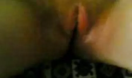 A vulgar blonde gets naked on the street and fingering a pee