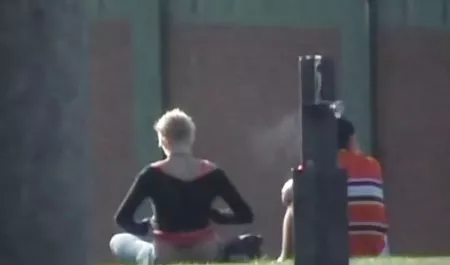 Cute babe undressing naked and doused with oil