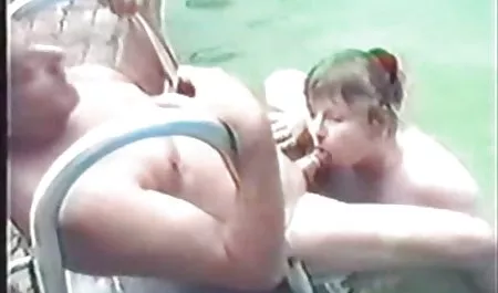 The depraved hitch is sexually posing in a bar and spreads her legs wide