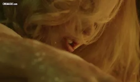 Olivia fingering her clitoris with a vibrator